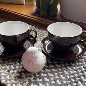 Pair of hot chocolate cup and saucers​​​​​​​​​​​​​​​​